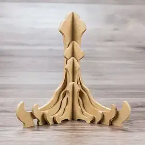 Put your canvas on a wooden easel or photo stand