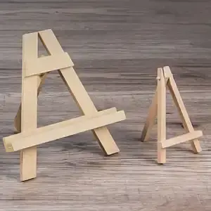 Put your canvas on a wooden easel or photo stand