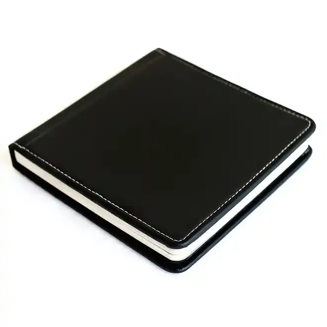 RapidStudio ultimate coffee table photobook album with black leather cover and white stitching
